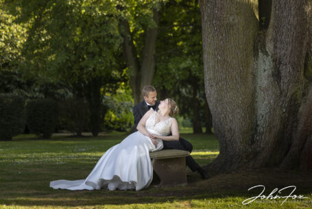 Bride and groom by the cedar tree at Ansty Hall, Coventry