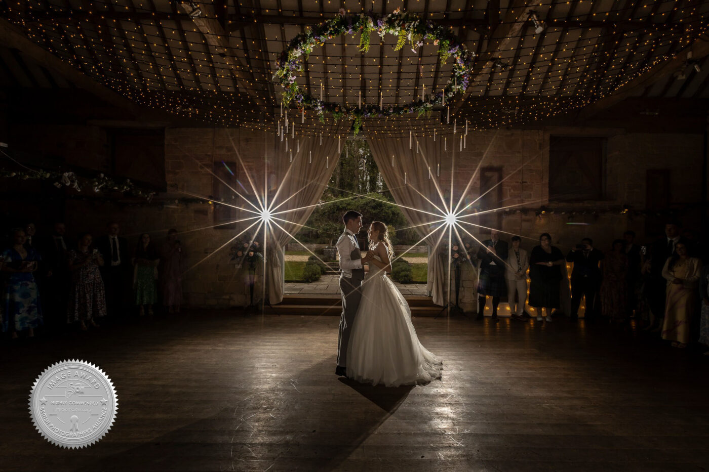 Award-winning wedding image by John Fox Wedding Photography of a first dance at a wedding celebration in Wiltshire