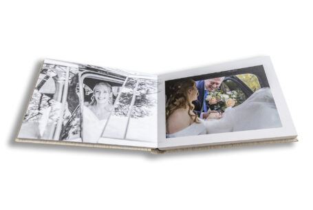 Beautiful Wedding Album from a Wedding in Wiltshire. The bride arriving at the church. Images by John Fox Wedding Photography.