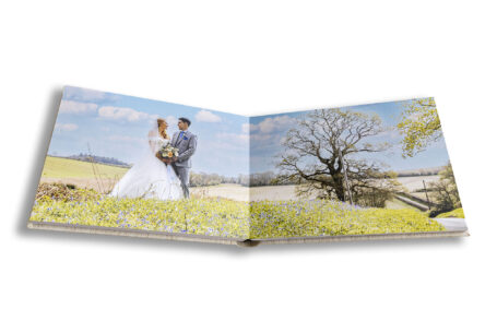 Beautiful Wedding Album from a Wedding in Wiltshire. Double page of the newly-weds by John Fox.
