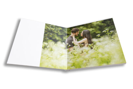 Bespoke wedding guest book. Pre-wedding photo in the grounds at Kilworth House