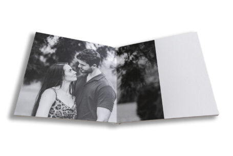 Bespoke wedding guest book photographed at Kilworth House. Black and white image of the couple.
