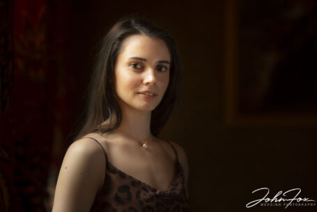 Bride to be photographed on the pre-wedding shoot indoors using window light at Kilworth House