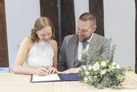 Photography for Both Legal and Celebrant Wedding Ceremonies. Signing the register.