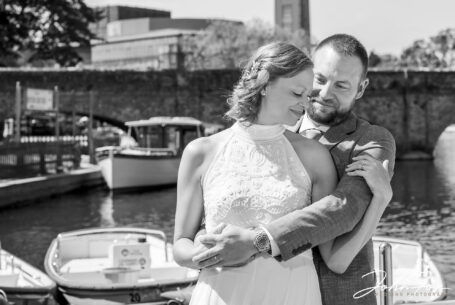 Photography for Both Legal and Celebrant Wedding Ceremonies. Bride and groom by the river in Stratford, black and white image.