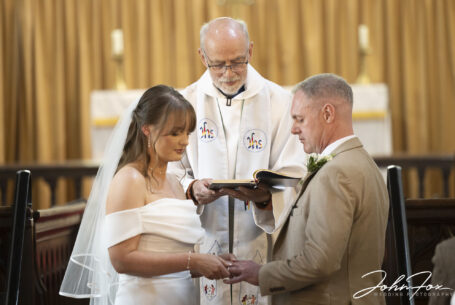 Wedding Photography in Leicestershire. Image of the exchange of wedding rings by John Fox