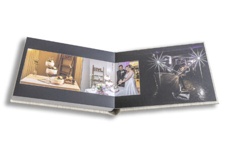 Wedding album images of cutting the cake and the first dance at Ansty Hall, Warwickshire