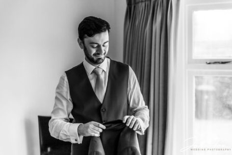 Dimitri, the groom, getting ready for his Warwickshire Wedding