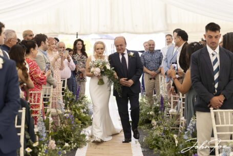 Brides entrance with her dad at her Warwickshire wedding.
