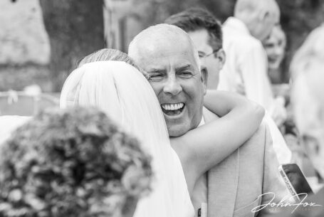 Congratulations - guests hugging the bride