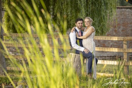 Bride and groom in the garden at the family home in Warwickshire.