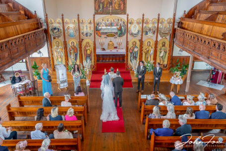 Wedding ceremony taken from the balcony at The Ascension of Our Lord Church in Leicester.