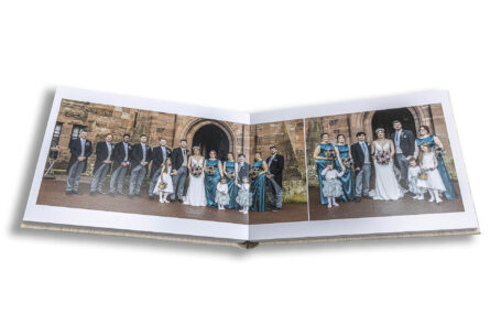 Wedding Album images by John Fox of the wedding guests and the happy couple in the grounds of Peckforton Castle