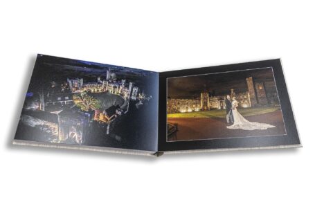 Stunning aerial wedding album image of Peckforton Castle, Cheshire.