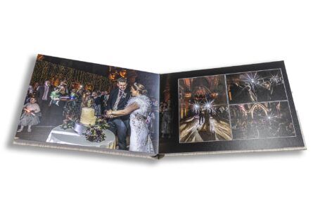 Cutting the cake and the first dance at Jenny and James' wedding celebrations at Peckforton Castle. Wedding album by John Fox Wedding Photography.