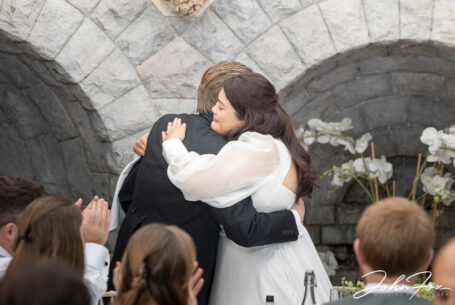 Bride and groom embrace after the speeches.