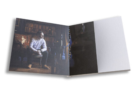 Bespoke wedding guest book containing images from the pre-wedding shoot. Simon, the groom-to-be, at Ansty Hall.
