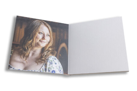 Bespoke wedding guest book containing images from the pre-wedding shoot. Natalie, the bride-to-be at Ansty Hall in Warwickshire.