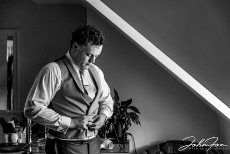 Wedding photographer Oxfordshire at Primrose Hill Farm. The Groom getting ready.