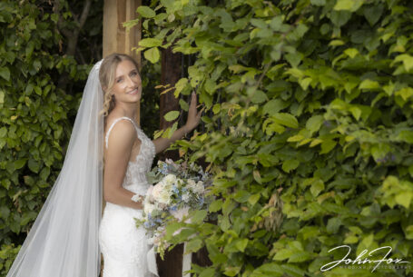 Bride in the grounds at Primrose Hill Farm, Oxfordshire.