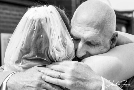 Bride and dad embrace after reveal moment at the Bedfordshire wedding