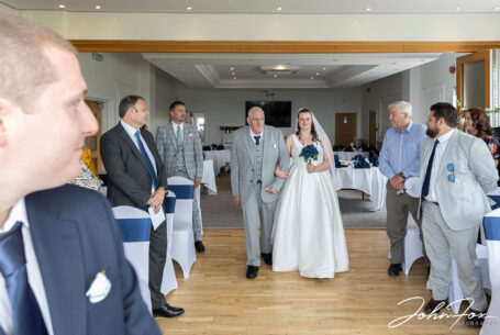 Bride's entrance to the ceremony with her father