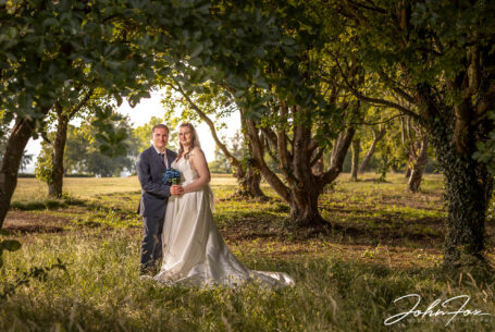 Bride and groom in woodland at Dunstable Downs Golf Club