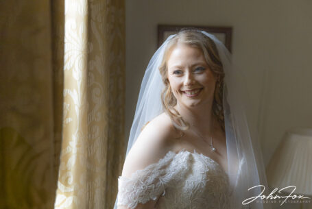 Portrait of the bride before the wedding ceremony at Ansty Hall. Image by John Fox Wedding Photography.
