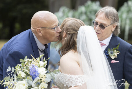 Hugs and kisses of congratulations for the bride, Natalie