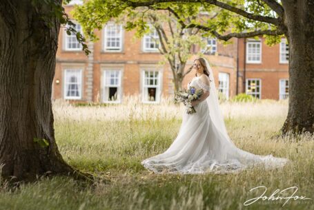 Bride portrait in the trees at Ansty Hall
