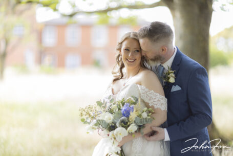Bride and groom in the grounds at Ansty Hall