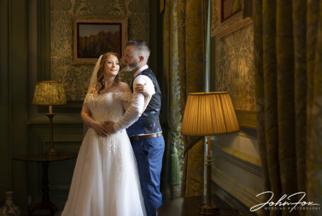 Natalie and Simon - a portrait using natural light by a window in Ansty Hall.