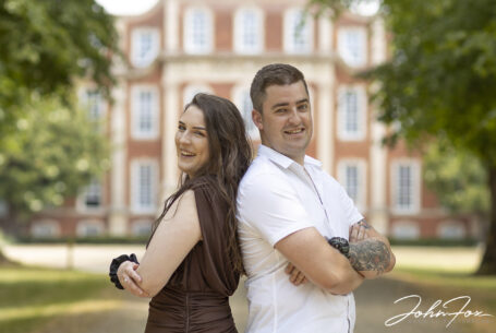Pre-wedding shoot showing bride and groom-to-be in the gardens at Chicheley Hall