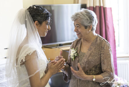 Bride with mum giving her daughter her blessing to marry.
