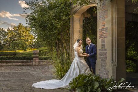 Bride and groom in the grounds at Putteridge Bury, Bedfordshire