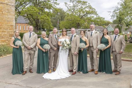 Image of bride and groom with groomsmen and bridemaids at The Nevill Arms, Leicestershire. Image by John Fox Wedding Photography.