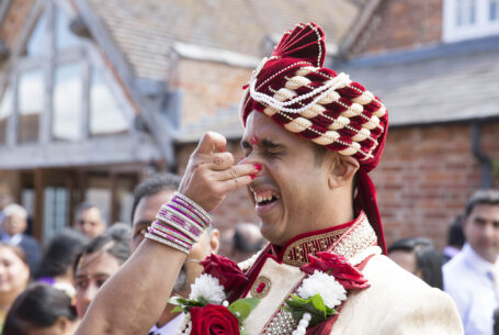 Wethele Manor, Warwickshire and an image of Indian nose pinching of the groom. Help Planning Your Wedding Hints Tips and Advice – Culture