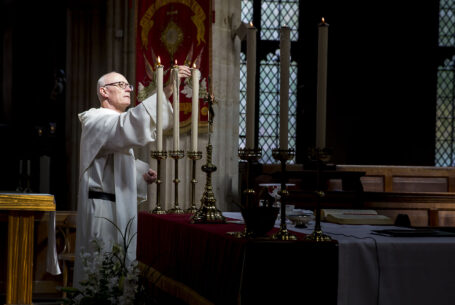 Help Planning Your Wedding Hints Tips and Advice - Choosing the Right Venue. Image of a Vicar preparing the church for a wedding.