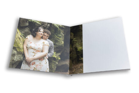 Bespoke guest book showing image of the bride and groom to be at Keele Hall, Staffordshire