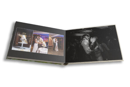 Wedding album showing Mariia and Oscar’s cake, cake cutting and first dance at Kilworth House - John Fox Wedding Photography