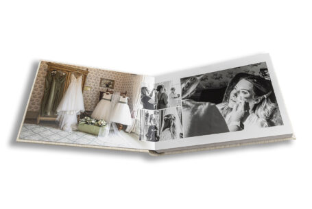 Flat lay of wedding album with 60 photos selected by the Lucy & Andrew – John Fox Wedding Photography