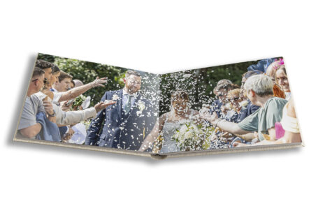 Bride and groom and confetti at Kilworth House captured by Leicestershire wedding photographer John Fox