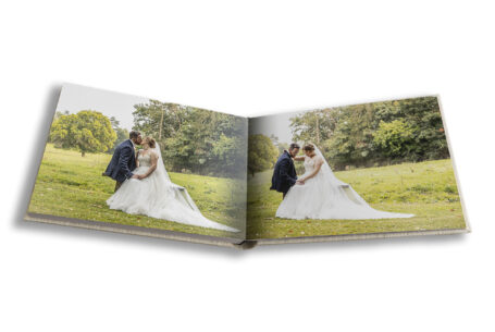 Natural wedding portrait in Kilworth House gardens, taken by John Fox, recommended Leicestershire photographer