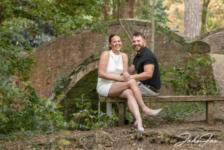 Bride and groom on their pre-wedding shoot photographed by the old canal bridge at Brownsover Hall