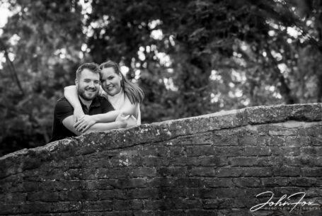 Gabrielle & William on their pre-wedding shoot, photographed on an old canal bridge at Brownsover Hall