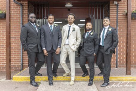 Groom and groomsmen outside the Kingdom of Jehovah’s Witnesses Church, located close to the centre of Birmingham.