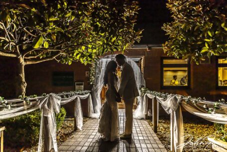 Bride and groom silhouettes outside the Fentham Hall venue. Image by John Fox Wedding Photography, Birmingham.