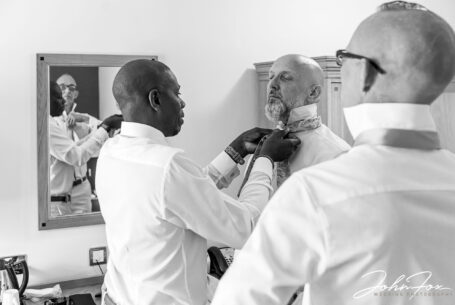 Groom and groomsmen preparations at the Bedfordshire wedding of Hazel and Chris