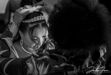 Black and white image of the bridal preparations at the Bedfordshire wedding. Image by John Fox