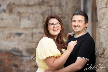 Pre-wedding shoot of the couple laughing. Wedding photographer in Leicestershire, John Fox.